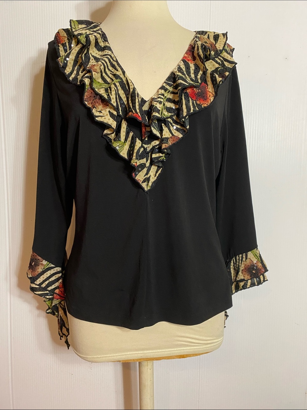 Jaipur Black V-Neck Blouse with Floral Zebra Ruffle